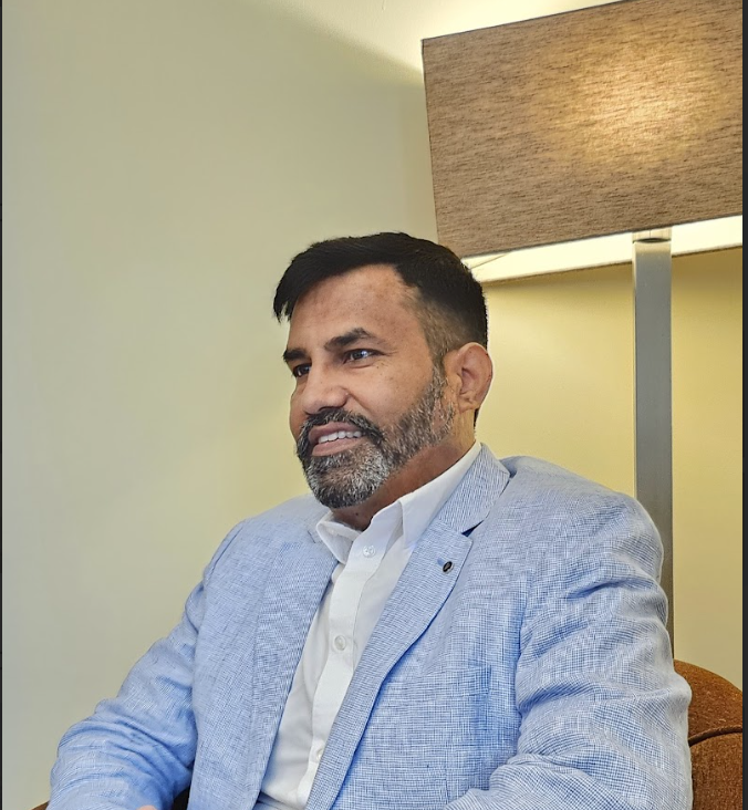 Dr. Trilok Singh